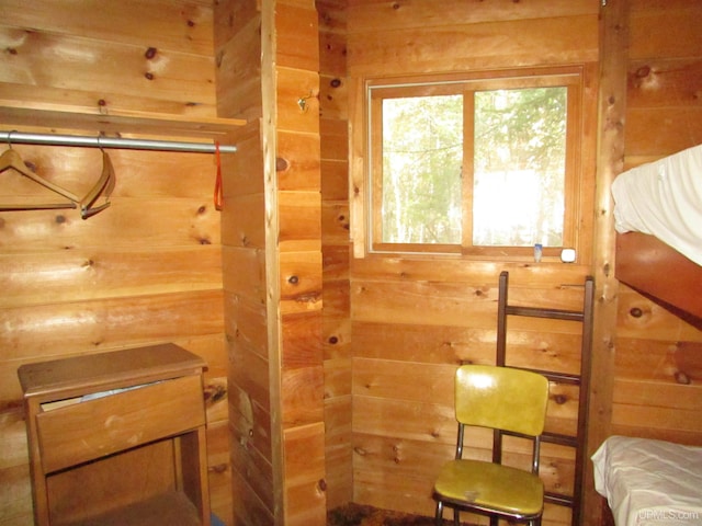 interior space featuring wood walls