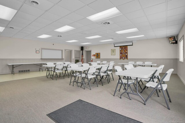 misc room with light hardwood / wood-style flooring and a paneled ceiling