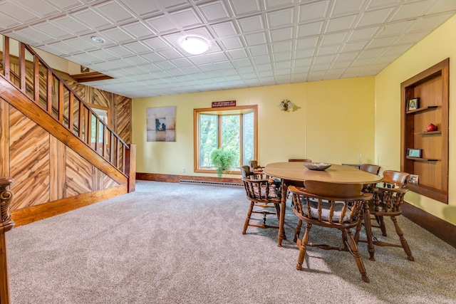 dining room featuring a baseboard radiator and carpet floors