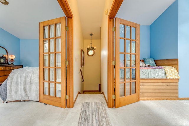 bedroom with light colored carpet