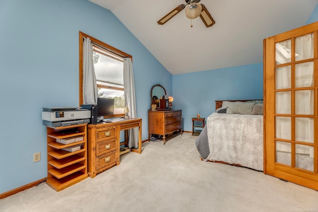 bedroom featuring ceiling fan, light carpet, and vaulted ceiling