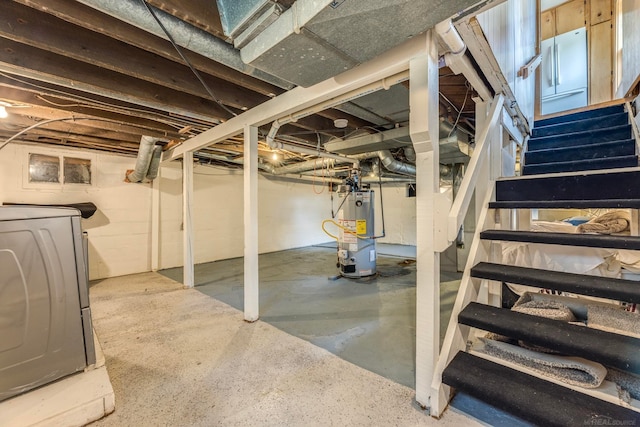 basement featuring washer / dryer and water heater