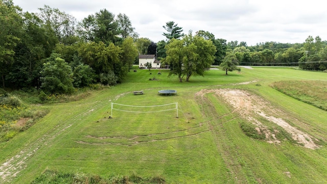 birds eye view of property with a rural view