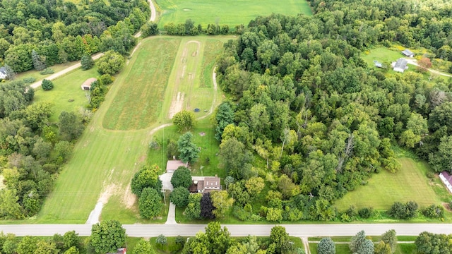 birds eye view of property featuring a rural view