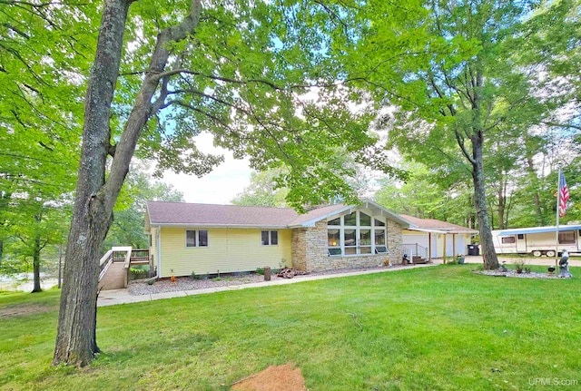 exterior space featuring a front yard