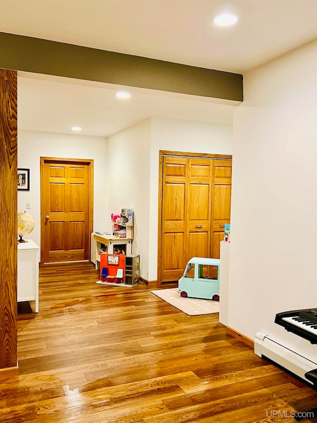 game room featuring hardwood / wood-style flooring