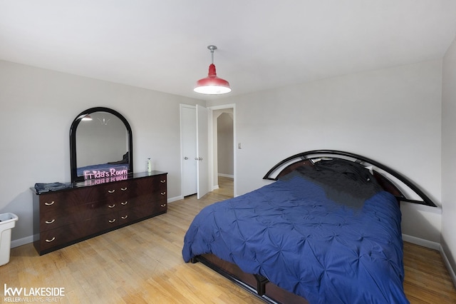 bedroom with light wood-type flooring