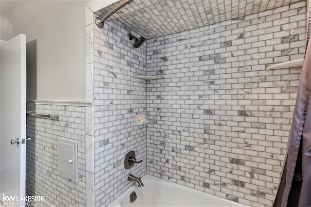 full bathroom with shower / bath combination with curtain