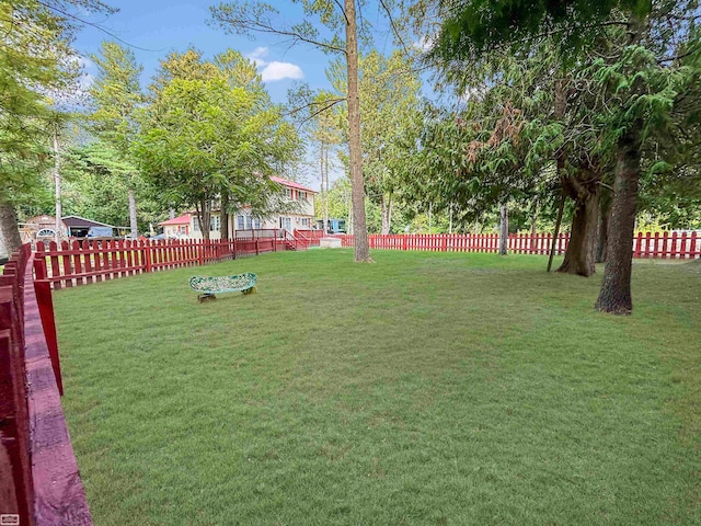 surrounding community featuring a lawn