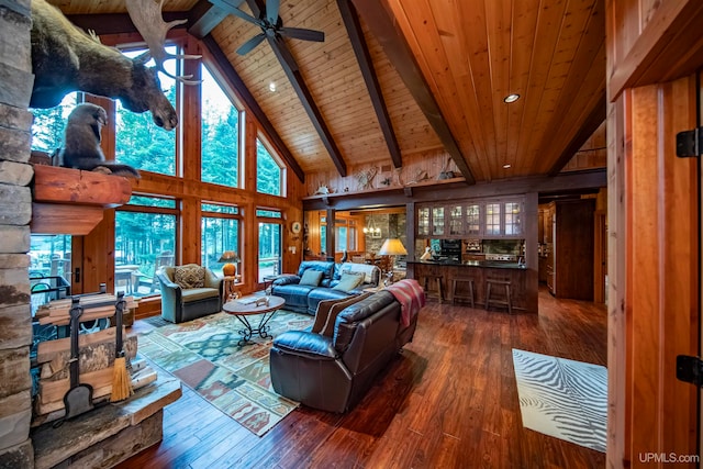 living room with wooden ceiling, dark hardwood / wood-style flooring, high vaulted ceiling, and ceiling fan