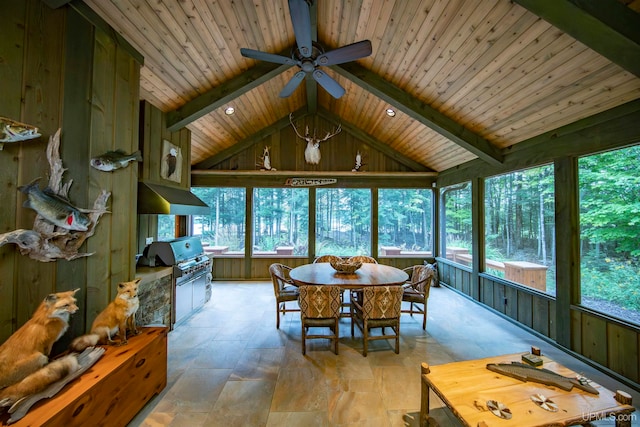 sunroom with wood ceiling, ceiling fan, and lofted ceiling with beams