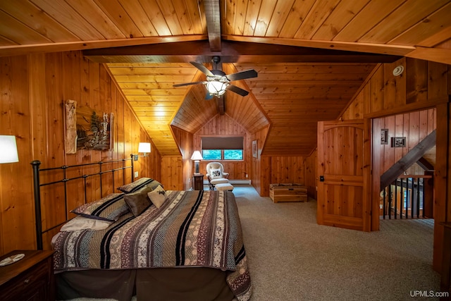 carpeted bedroom with wood walls, wooden ceiling, and lofted ceiling with beams