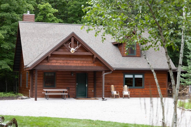 view of log home