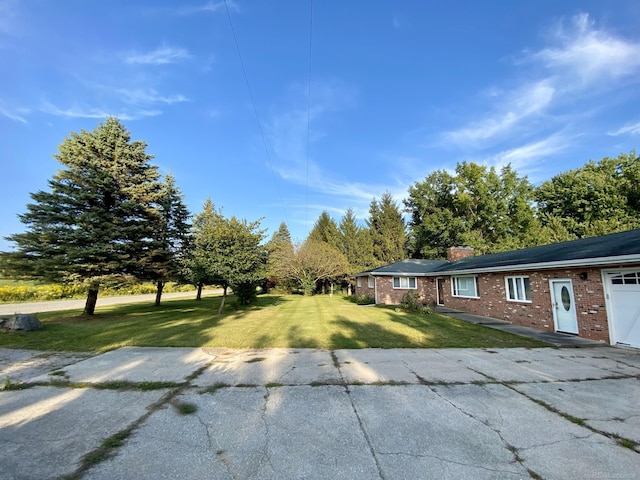 exterior space with a lawn