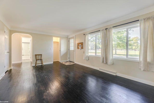 empty room featuring dark wood-type flooring