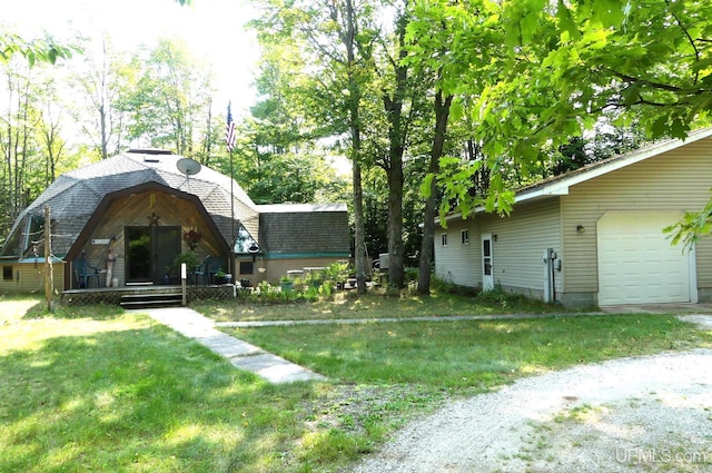 view of yard with a garage