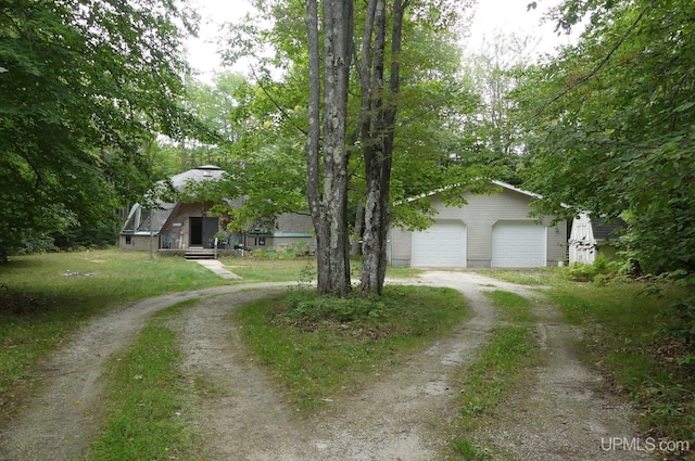 view of front of house featuring a garage and driveway