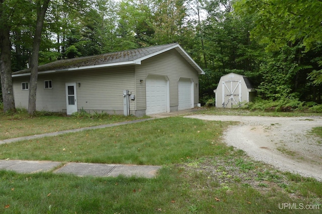 detached garage featuring a storage unit