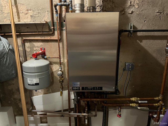 utility room with water heater