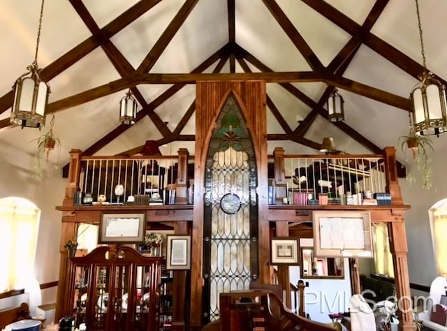 interior space featuring high vaulted ceiling