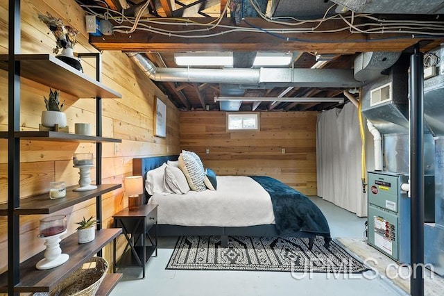 interior space with concrete floors and wood walls