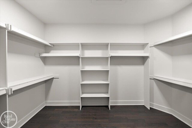 unfurnished room featuring dark hardwood / wood-style flooring