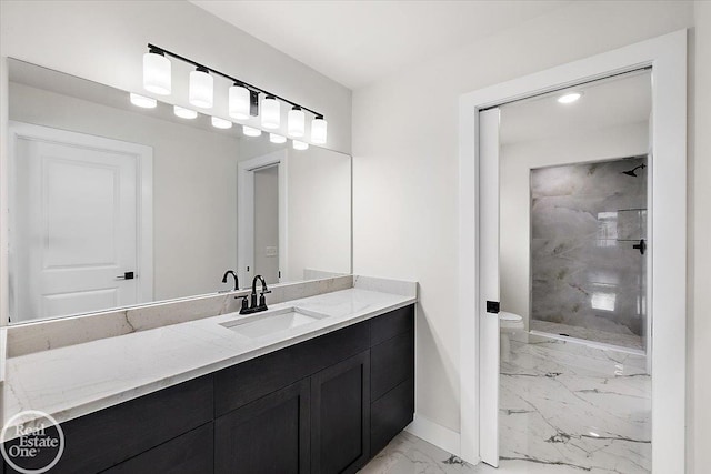 bathroom featuring a shower stall, baseboards, toilet, marble finish floor, and vanity