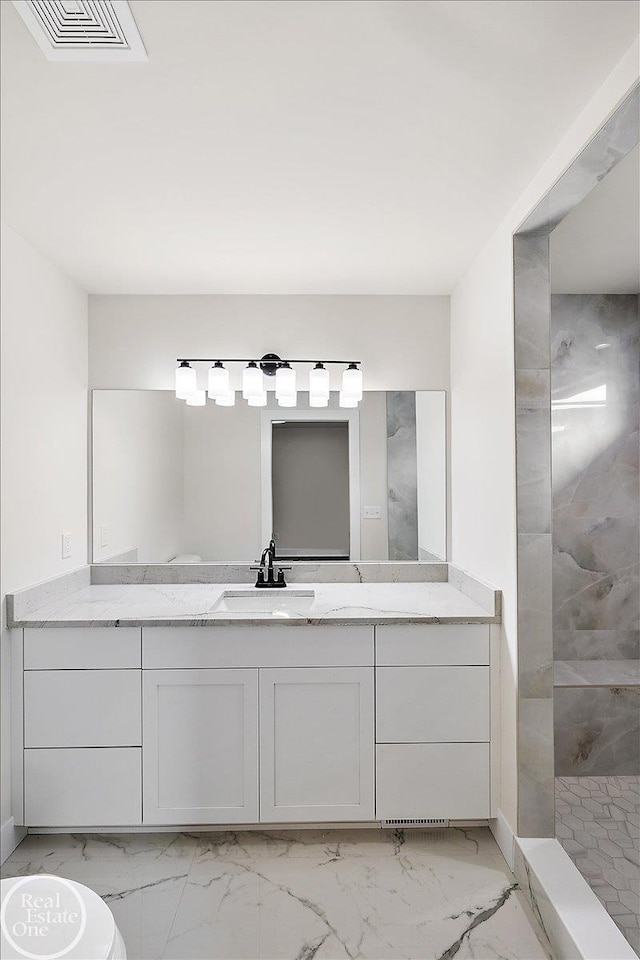 full bathroom with visible vents, walk in shower, toilet, marble finish floor, and vanity