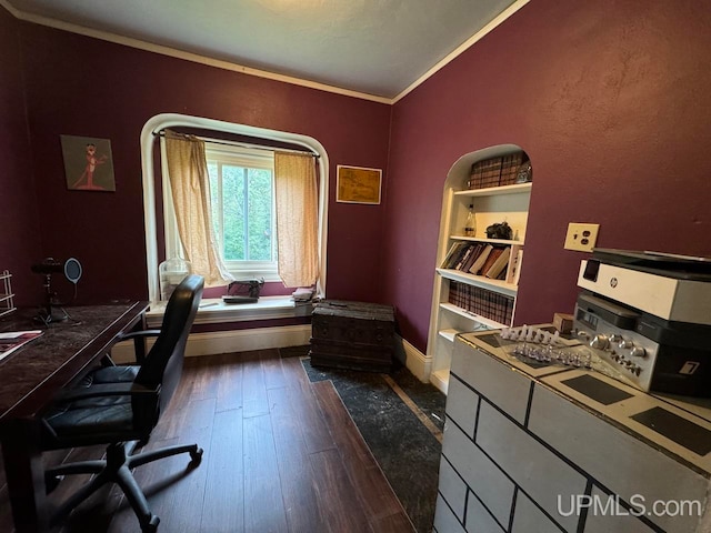 office area with dark wood-type flooring and ornamental molding