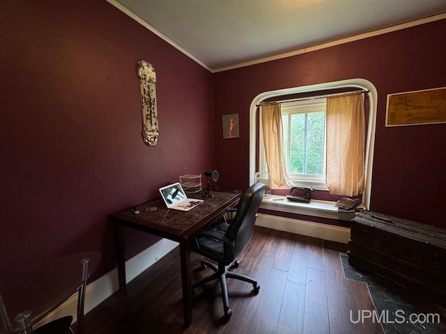 home office with crown molding and dark wood-type flooring