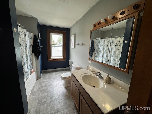 full bathroom featuring shower / bath combination with curtain, toilet, and vanity