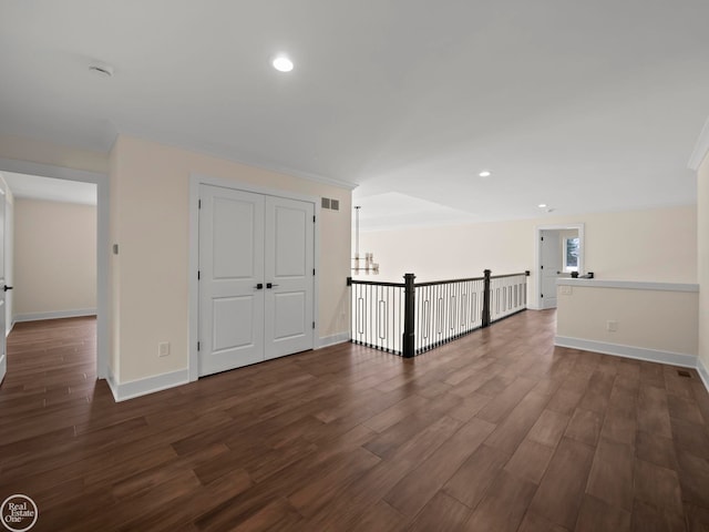 unfurnished room featuring dark hardwood / wood-style floors