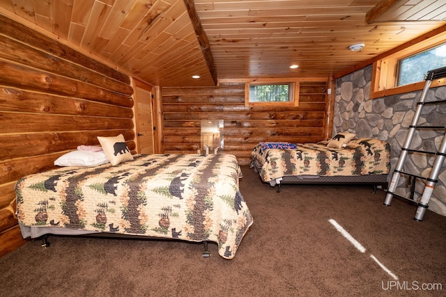 unfurnished bedroom with multiple windows, carpet, and wooden ceiling