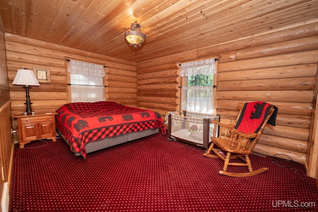 N5491 Foster City Rd, Vulcan, MI 49892 - bedroom with wooden ceiling, dark carpet, and rustic walls