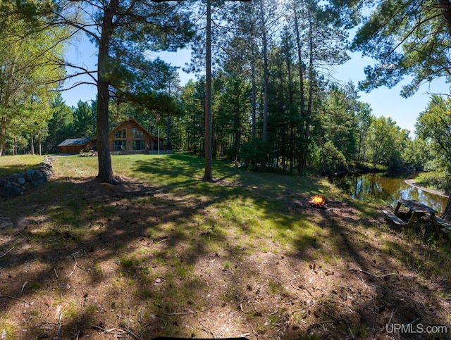 view of yard with a water view