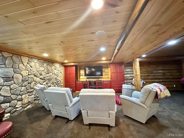 home theater room featuring wood ceiling and rustic walls