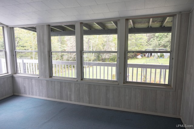 unfurnished sunroom with a healthy amount of sunlight