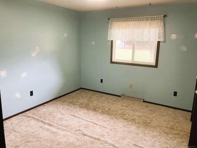 view of carpeted spare room