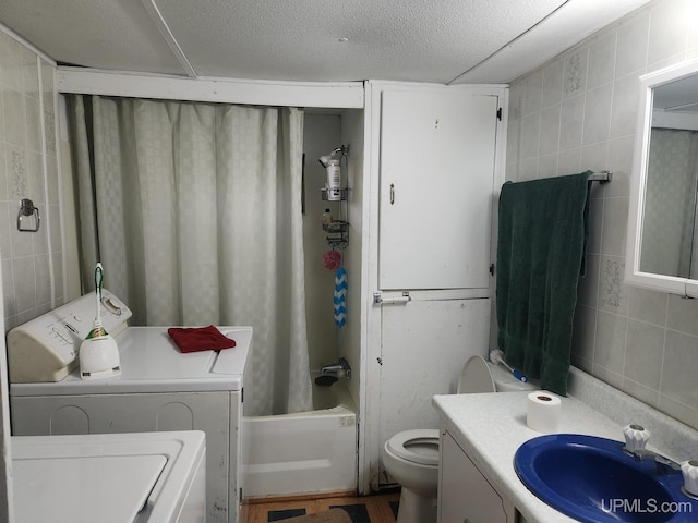 full bathroom featuring vanity, toilet, shower / tub combo, and tile walls