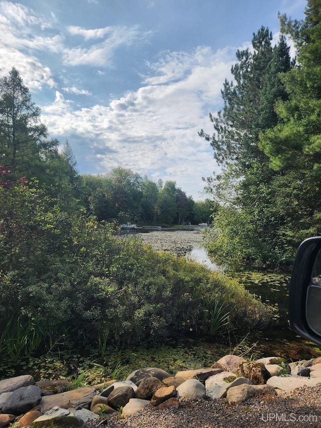 view of yard with a water view