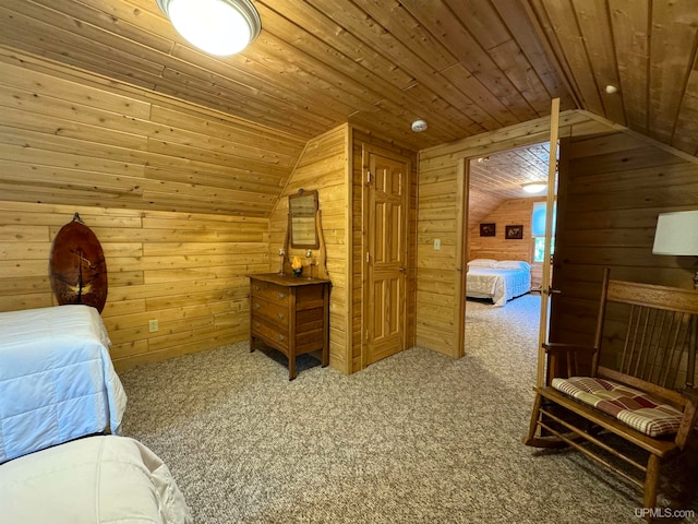 carpeted bedroom with lofted ceiling, wooden walls, and wood ceiling