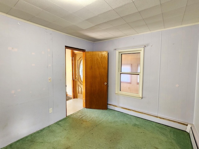 295 W Birch St, Harrison, MI 48625 - spare room featuring carpet flooring and a baseboard heating unit