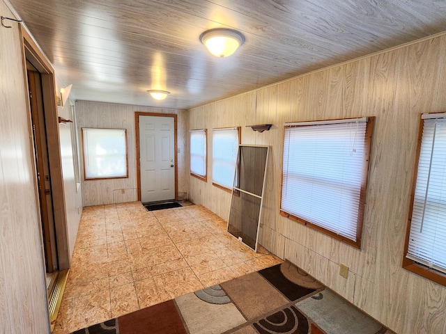 295 W Birch St, Harrison, MI 48625 - entrance foyer with wooden walls