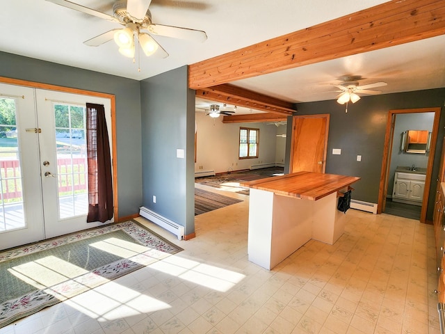 295 W Birch St, Harrison, MI 48625 - kitchen featuring a baseboard heating unit, butcher block counters, ceiling fan, french doors, and beamed ceiling