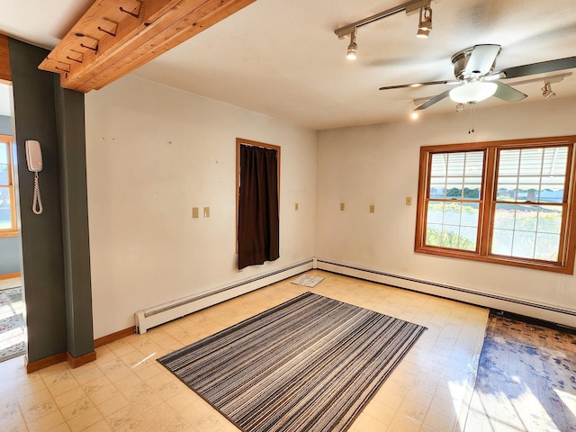 295 W Birch St, Harrison, MI 48625 - unfurnished room with light flooring, a baseboard radiator, ceiling fan, and rail lighting