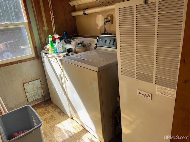 washroom with separate washer and dryer