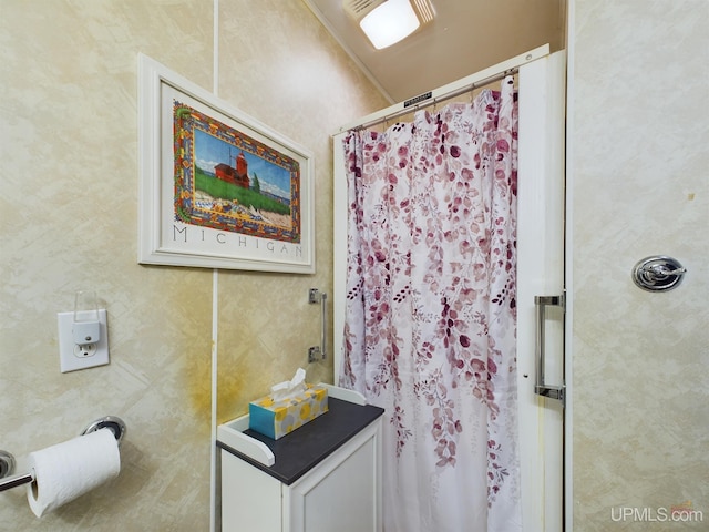 bathroom with a shower with shower curtain