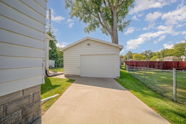 garage featuring a yard