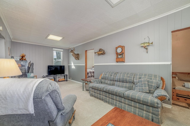 carpeted bedroom with wooden walls and crown molding