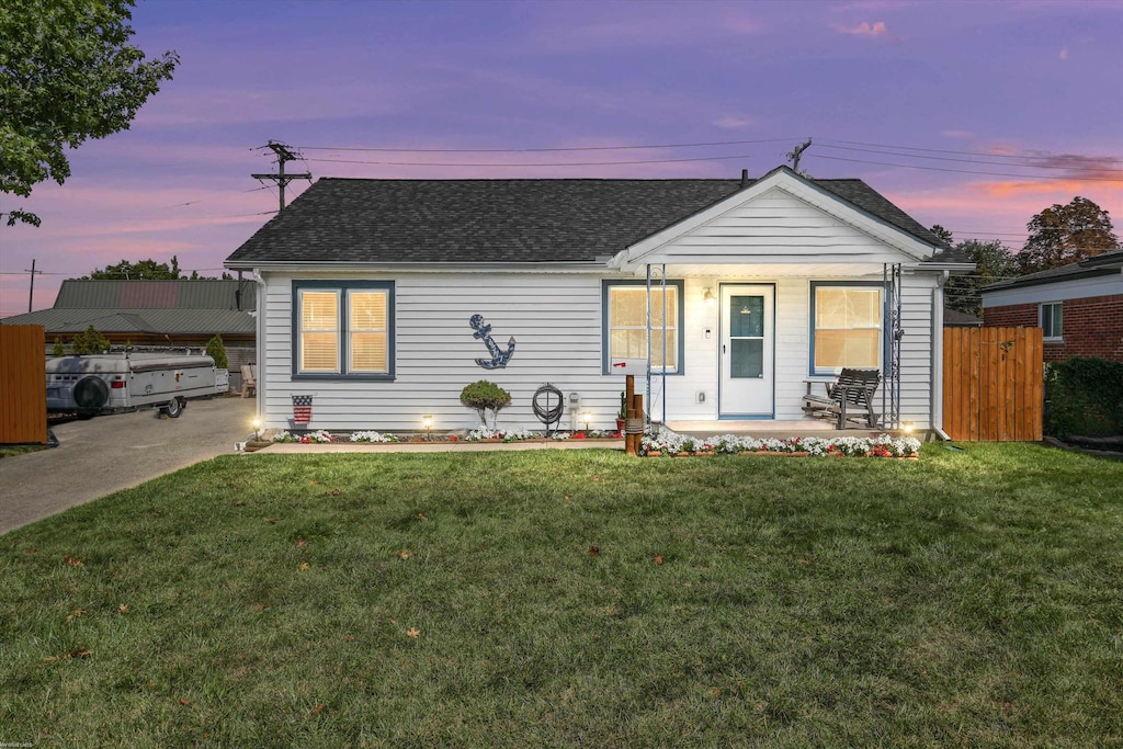 view of front of house with a lawn